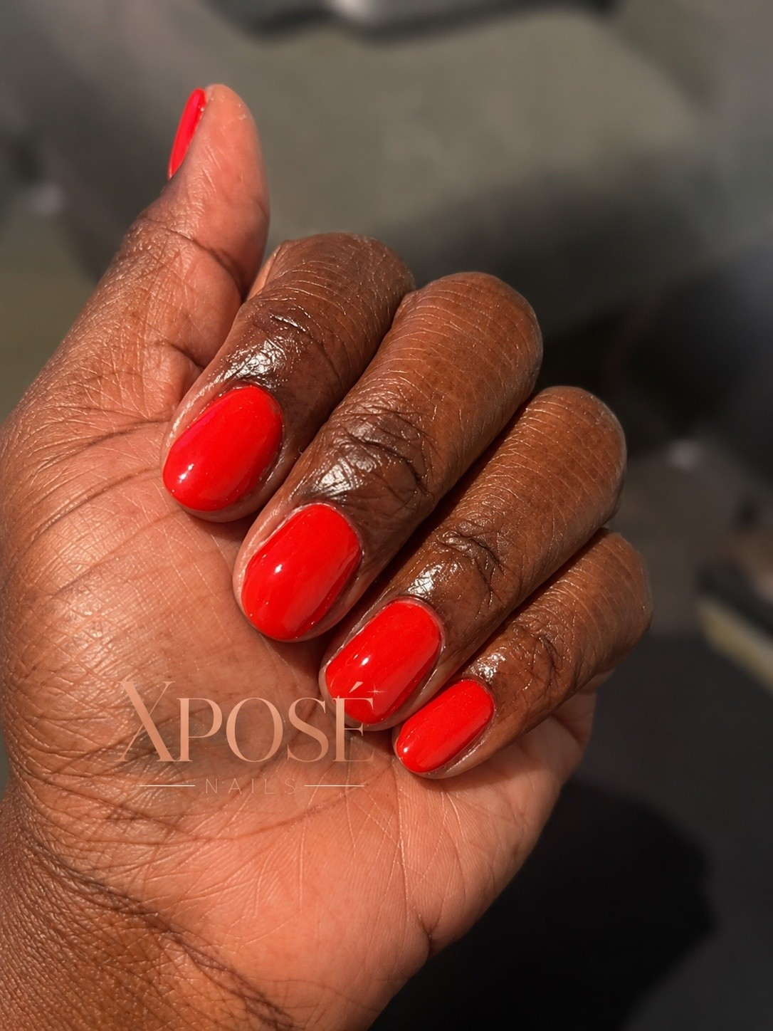 Glossy red gel manicure by Xposé Nails
