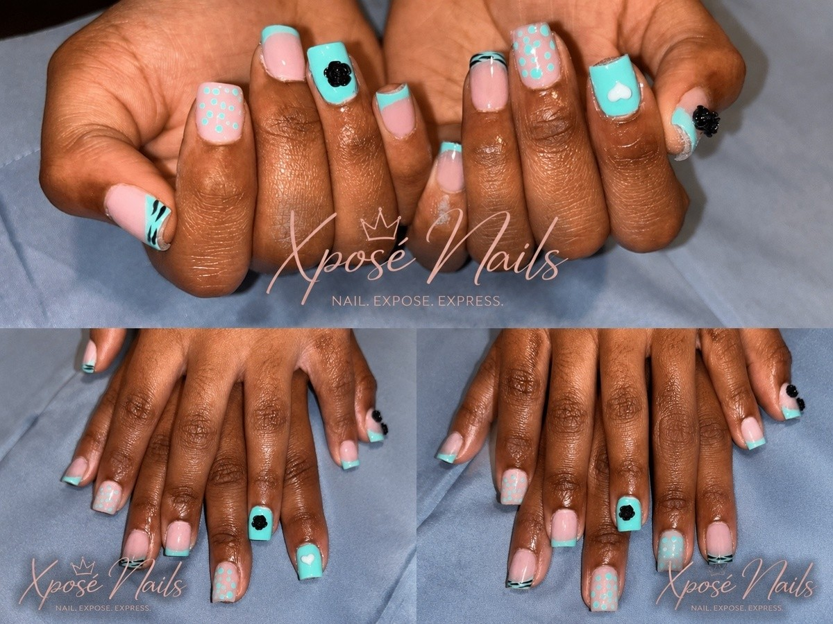 Mint green French tips with dots, hearts, and black florals